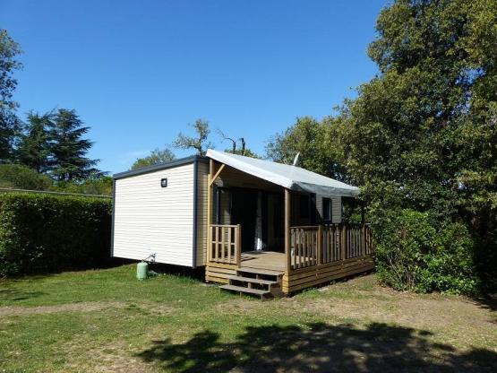 Mobilheim Premium  32m² 3 Schlafzimmer - Halbüberdachte Terrasse - TV