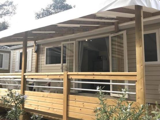 Mobilheim 36m² - Klimaanlage + TV + überdachte Terrasse