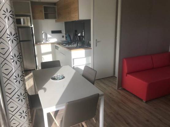 Mobilheim Premium EMBRUNS 35m² 2 Zimmer + Halbüberdachte Terrasse 15m² - Meersicht