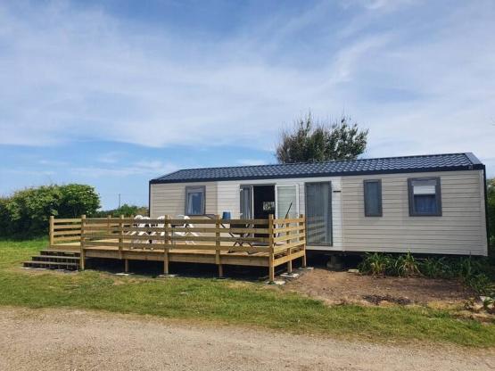 Mobilheim Natura 3 Schlafzimmer 2 Duschräume TV+LV mit Terrasse XXL, Meerblick