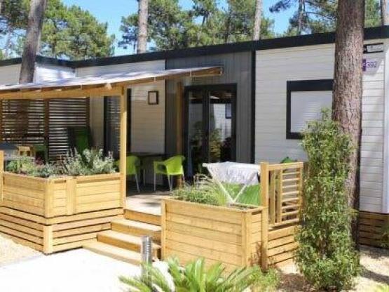 Mobilhome Confort+ 30 m² (3 chambres)  (1 à 5 et 5 à 10 ans) 6/8 pers **