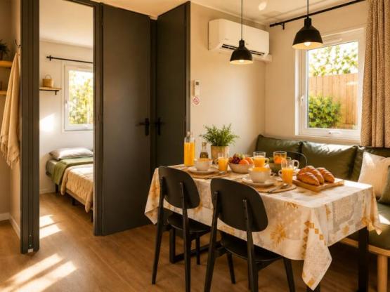 Mobilheim Premium 30m² (2 Schlafz.) + überdachte Terrasse + Klima + TV + LV + Wäsche