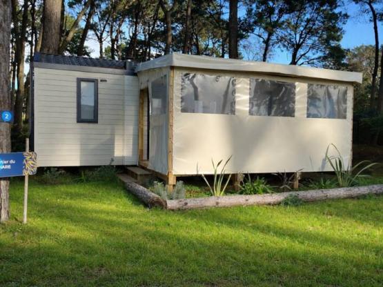 Mobilheim Confort plus - 27m² - 2 Schlafzimmer + sofa - überdachte terrasse