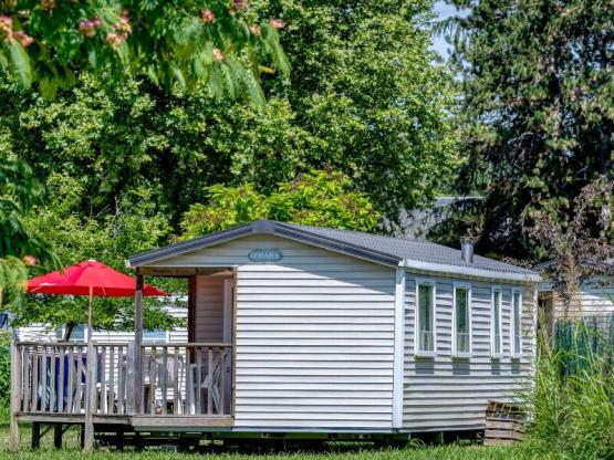 Mobilheim Standard 27 m² 2 Zimmer halbbedeckte Terrasse 7 m² + TV