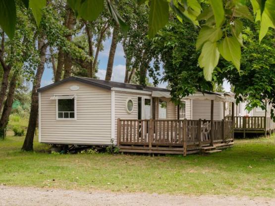 Mobilheim Komfort 31m² (3 Zimmer) + TV + überdachte Terrasse 18m²