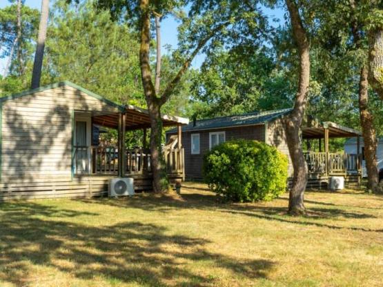 Mobilheim 2 Zimmer 26m² klimatisiert und Fernsehen + Überdachte Terrasse