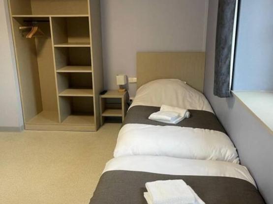 01/ TWIN ODER EINZELSCHLAFZIMMER