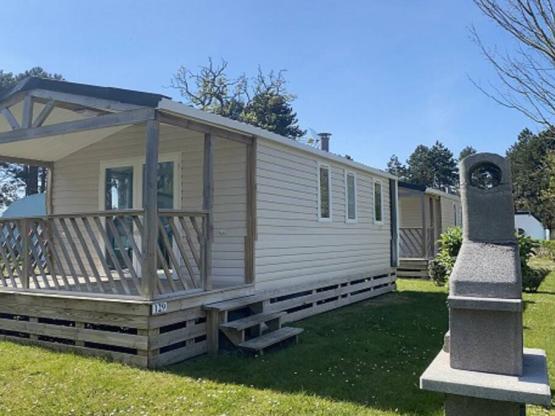 Mobilheim Premium 25 m² - überdachte Terrasse - 2 Zimmer +TV + Spüllmachine